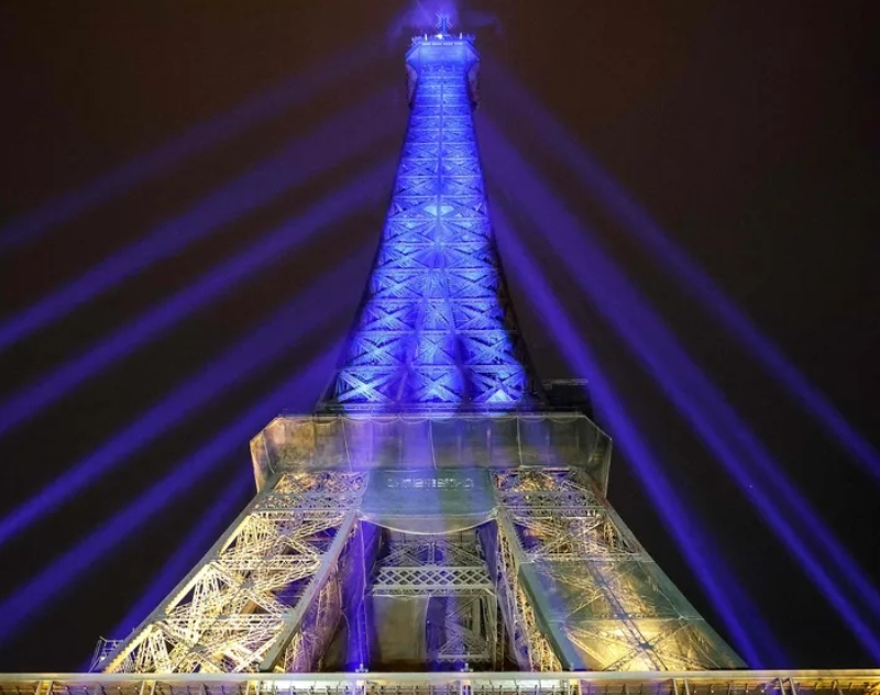 102171748-topshot-a-photo-shows-the-eiffel-tower-lit-in-the-colours-of-the-ukrainnian-flag-in-a-sh
