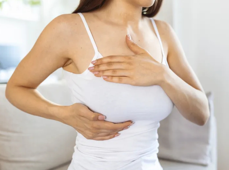 young-caucasian-woman-palpating-her-breast-by-herself-that-she-concern-about-breast-cancer-healthcare-breast-cancer-concept(1)