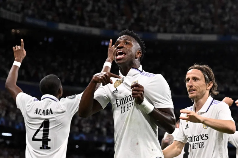 102974825-topshot-real-madrids-brazilian-forward-vinicius-junior-c-celebrates-with-teammates