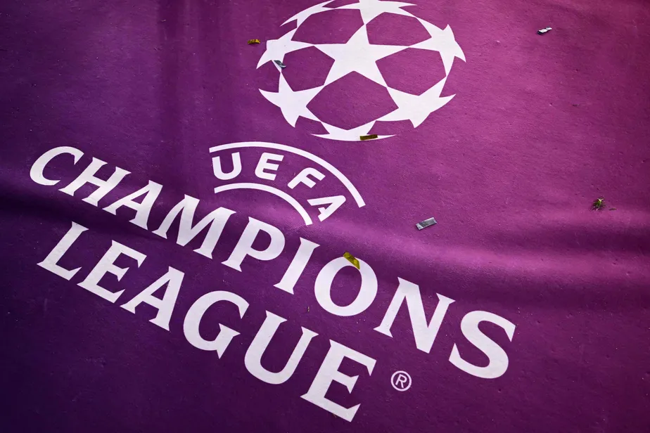 103328468-confetti-covers-a-carpet-bearing-the-logo-of-the-uefa-champions-league-after-the-final-foo